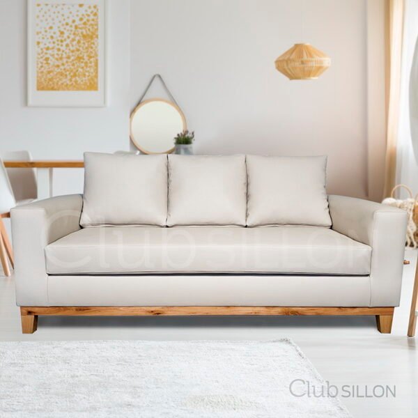 sofa comodo de estilo tradicional con base de madera a la vista para living moderno